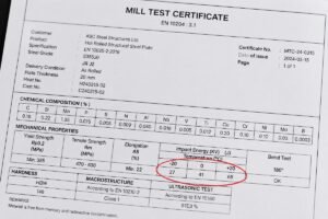 Close-up of a Mill Test Certificate highlighting impact energy values for S355J0 JR J2 structural steel