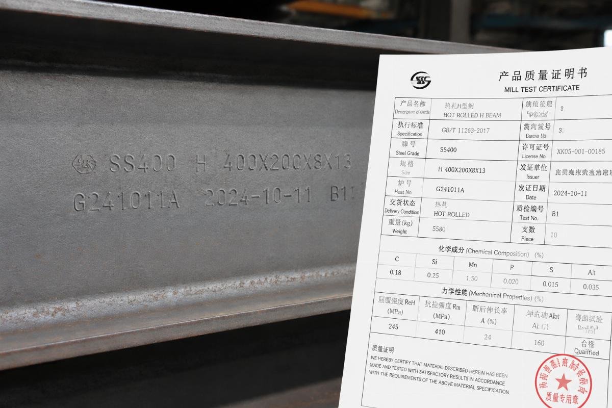 Close-up of heat number stamping on structural steel beam with matching certificate
