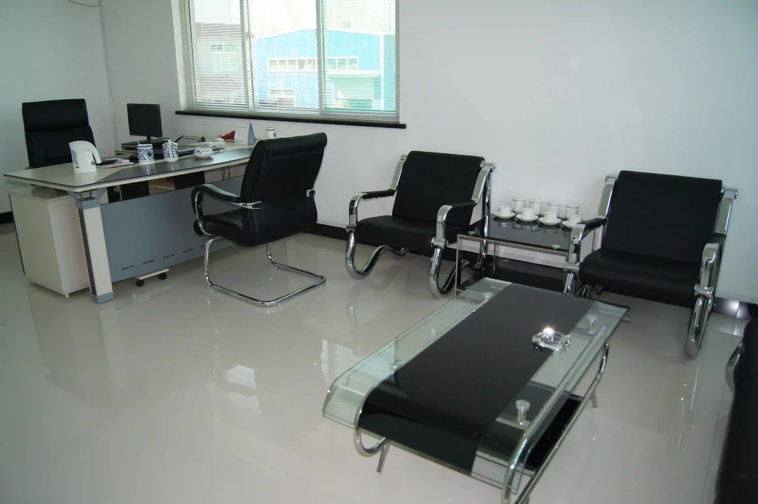 Team members working in the SD XJY Steel administrative office